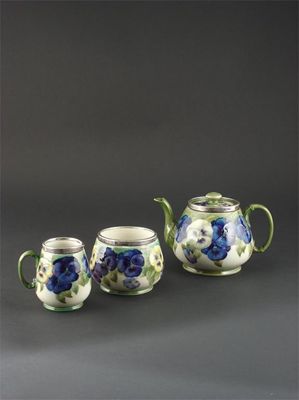 Appraisal: Pansy' a James Macintyre teapot and cover milk-jug and sugar