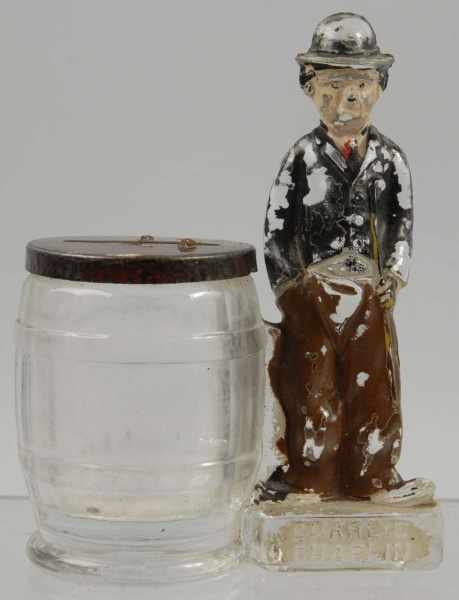 Appraisal: Glass Charlie Chaplin Candy Container Description Original closure paint No