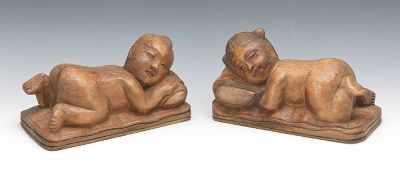 Appraisal: A Pair of Heavenly Twins Carved Wood Headrests Carved natural