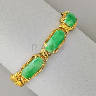 Appraisal: JADE AND K GOLD BRACELET Four translucent mottled green jade