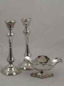 Appraisal: A pair of silver candlesticks hallmarked Birmingham approx cm high