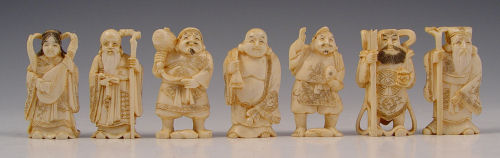 Appraisal: GROUP OF JAPANESE CARVED OKIMONO Each signed by the artist