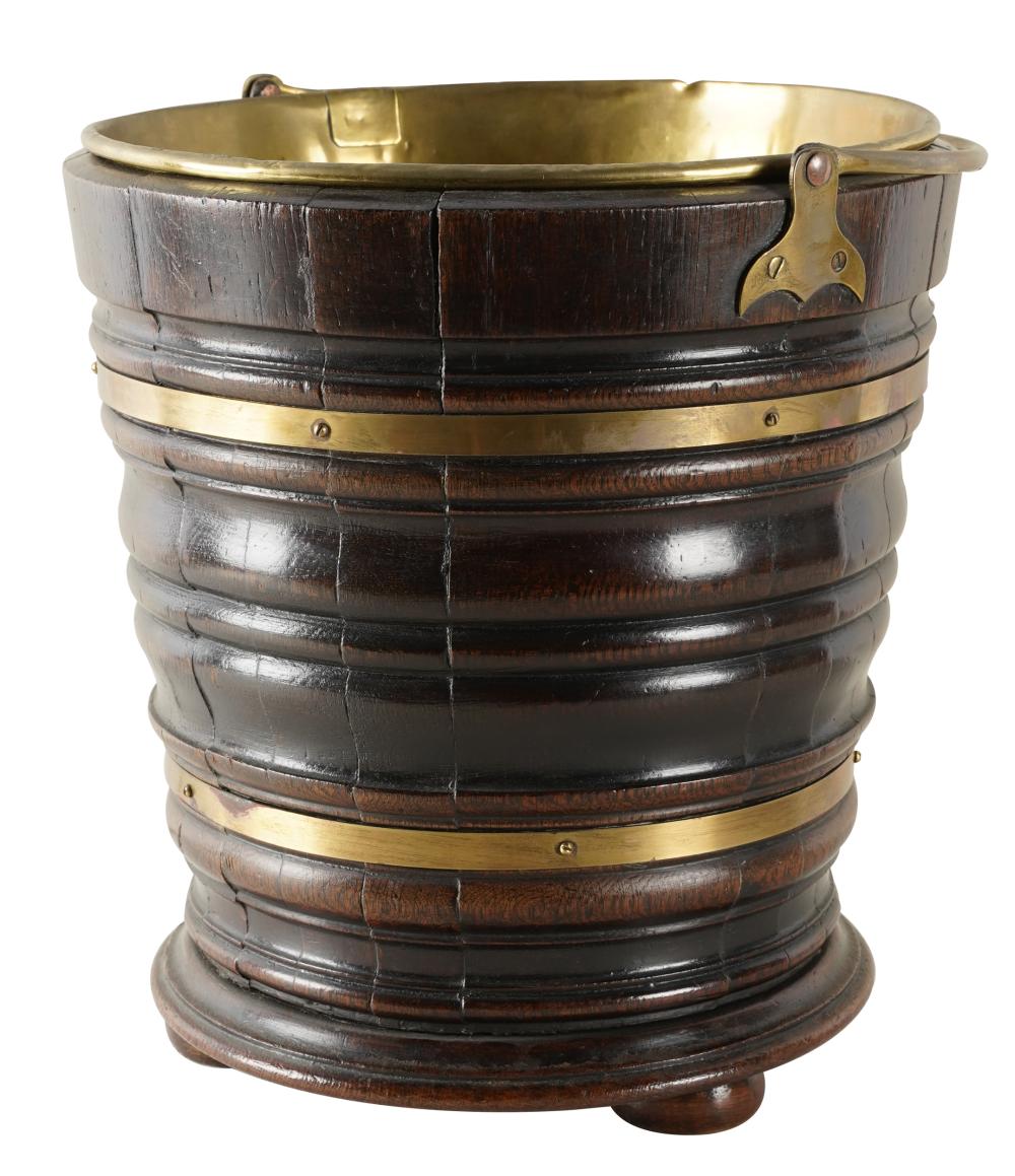 Appraisal: ENGLISH BRASS-BOUND OAK BUCKETon three feet with removable brass liner