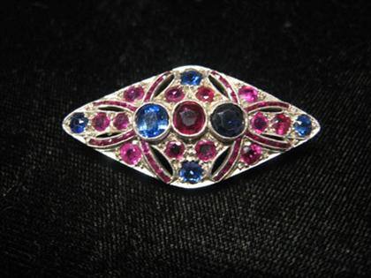 Appraisal: White gold ruby and sapphire brooch Diamond shaped white gold