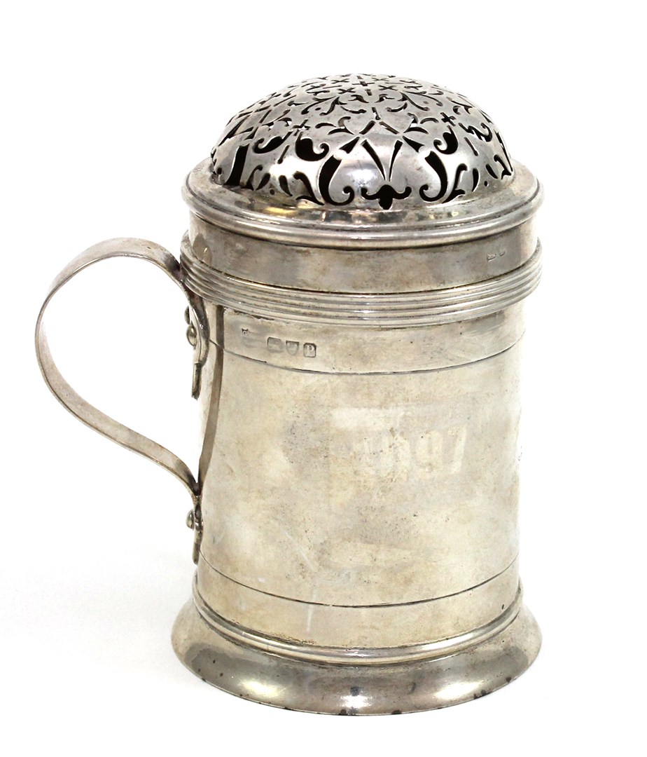 Appraisal: A large late Victorian silver kitchen sugar caster of cylindrical