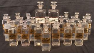 Appraisal: Twenty Two Apothecary Glass Bottles with Painted bent glass labels