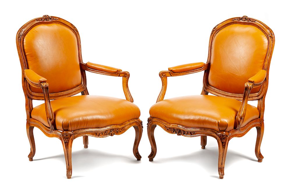 Appraisal: A Pair of Louis XV Leather Upholstered Beechwood Fauteuils A