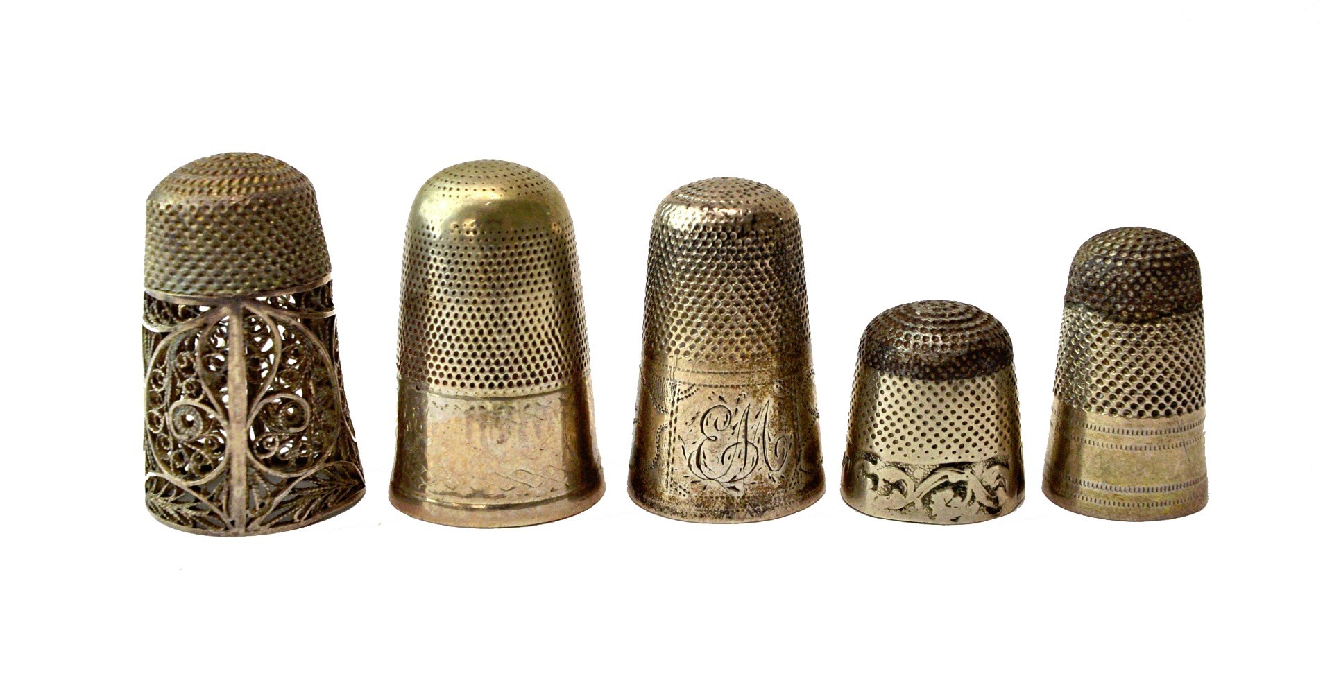 Appraisal: A George III silver filigree work thimble with later engraved