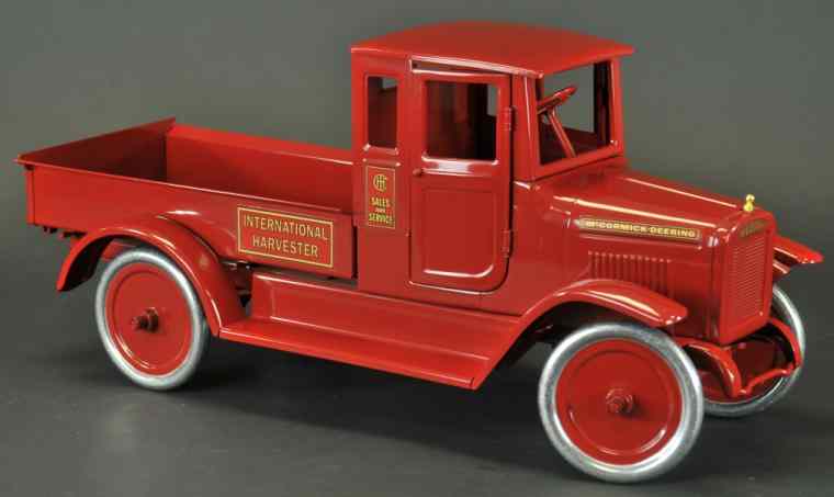 Appraisal: RED BABY DUMP TRUCK Contemporary International Harvester painted red overall