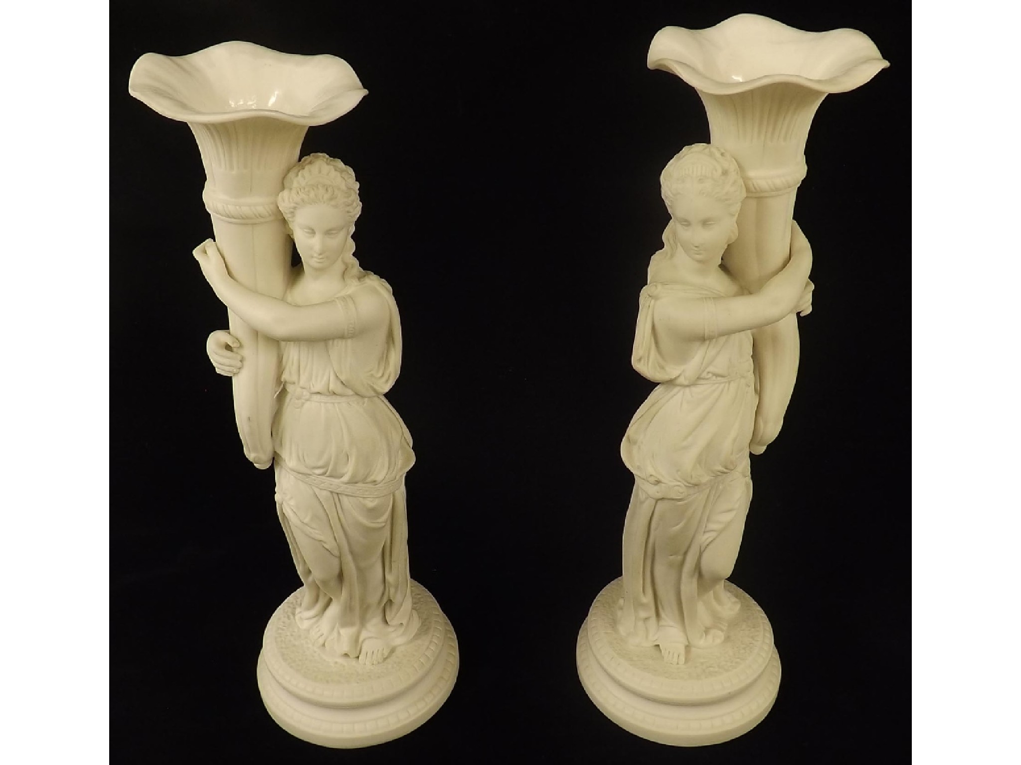 Appraisal: Pair of bisque porcelain spill vases in the form of