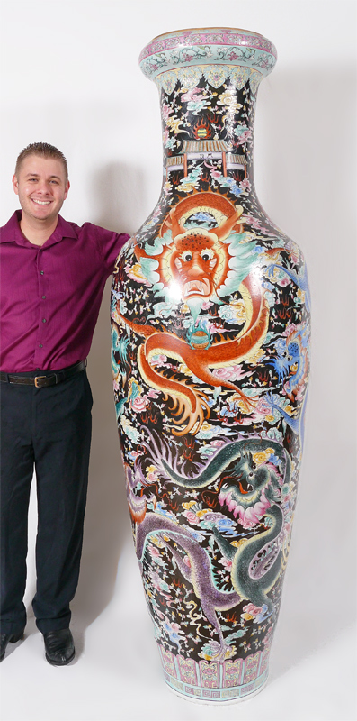 Appraisal: A MONUMENTAL FT TALL ORIENTAL PALACE VASE Incised polychrome dragons