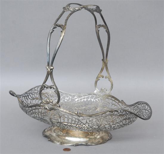 Appraisal: STERLING SILVER BASKET The full arabesque openwork bowl with different