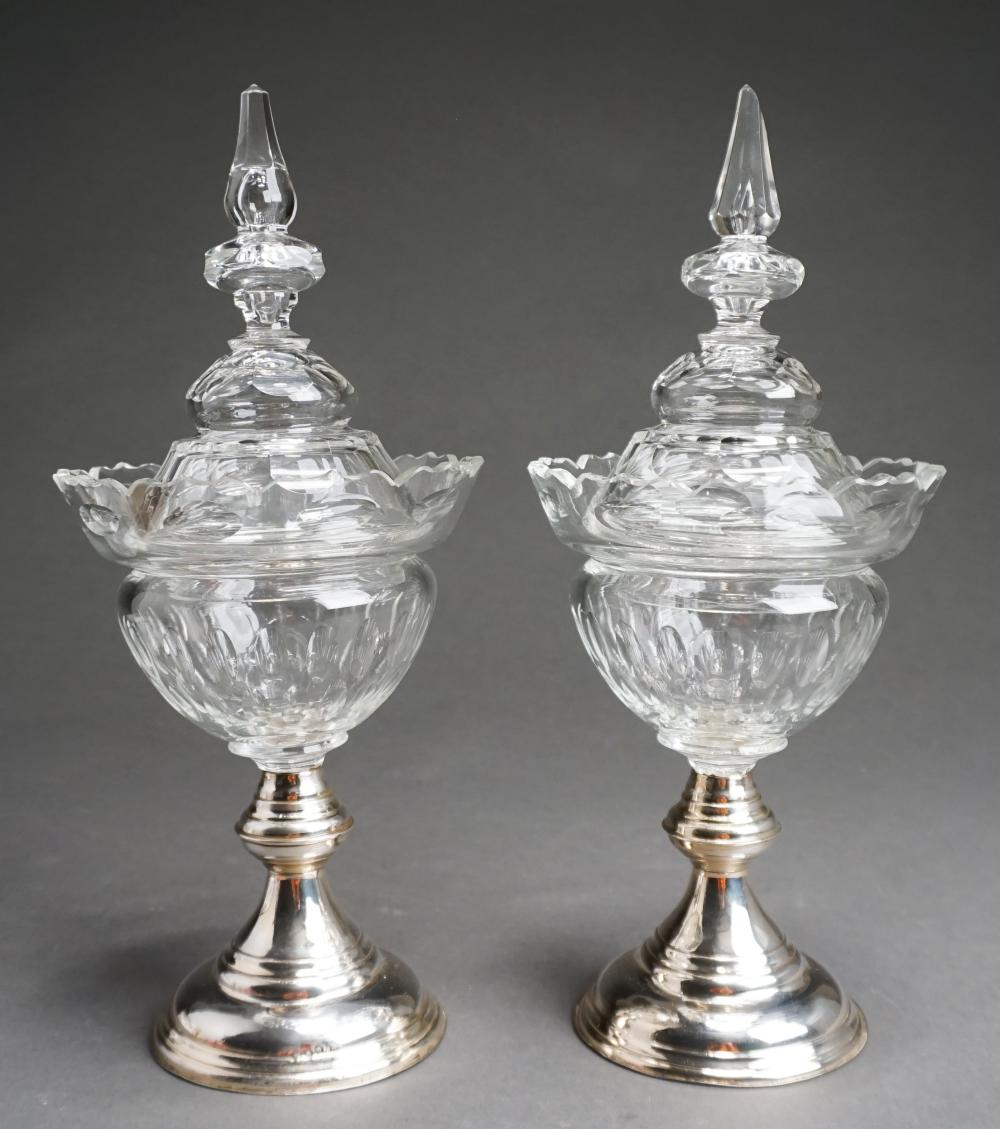 Appraisal: PAIR CONTINENTAL SILVER BASE CRYSTAL COVERED URNS H IN CM