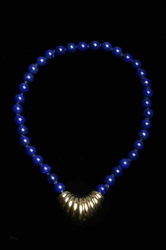 Appraisal: MATCHED ROUND LAPIS LAZULI BEAD CHOKER CENTERING K YELLOW GOLD