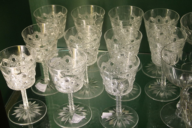 Appraisal: A COLLECTION OF ELEVEN CUT GLASS WINE GLASSES of conical