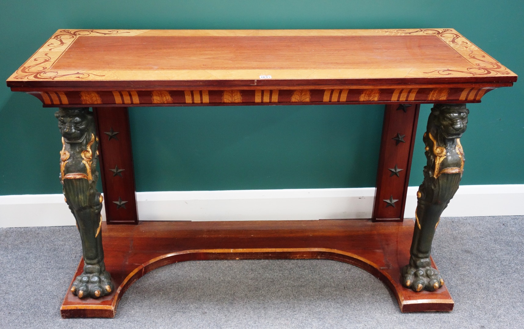 Appraisal: A Regency style marquetry inlaid mahogany and satin birch console