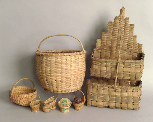 Appraisal: Two-tiered hanging basket together with a buttocks basket gathering basket