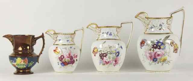 Appraisal: A graduating set of three porcelain jugs circa with gadrooned