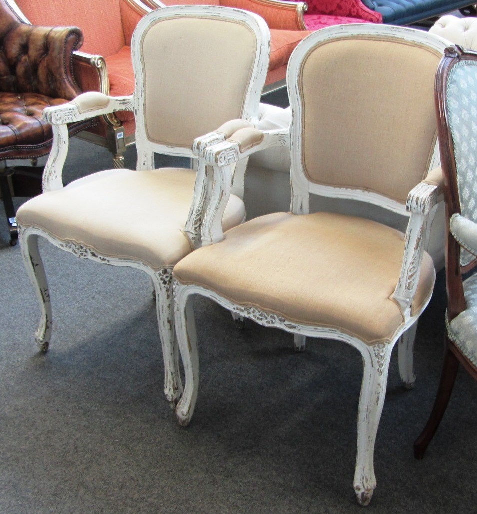 Appraisal: A pair of Louis XV style white painted fauteuils