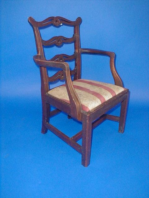 Appraisal: A th century child's carver chair with pierced ladderback in