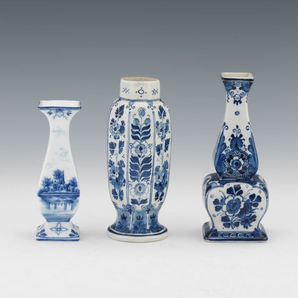 Appraisal: THREE SMALL DELFT VASES One octagonal in shape signed to