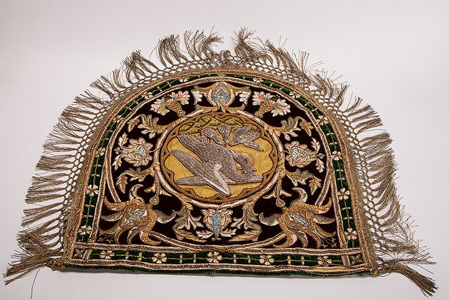 Appraisal: A CONTINENTAL SILVER AND GOLD THREAD EMBROIDERED SHIELD SHAPE PANEL