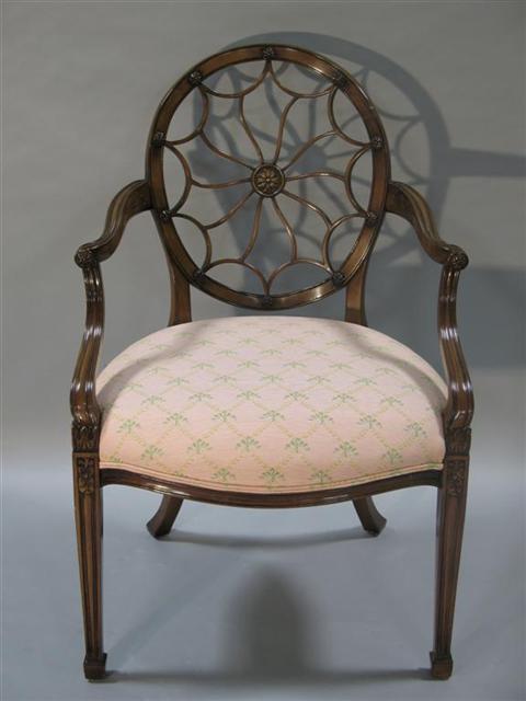 Appraisal: SMITH WATSON WHEELBACK ARMCHAIR th century oval back with central