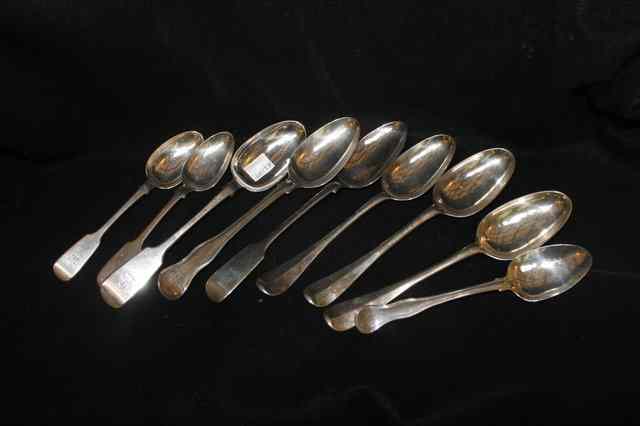 Appraisal: A COLLECTION OF NINE SILVER SPOONS in various styles and