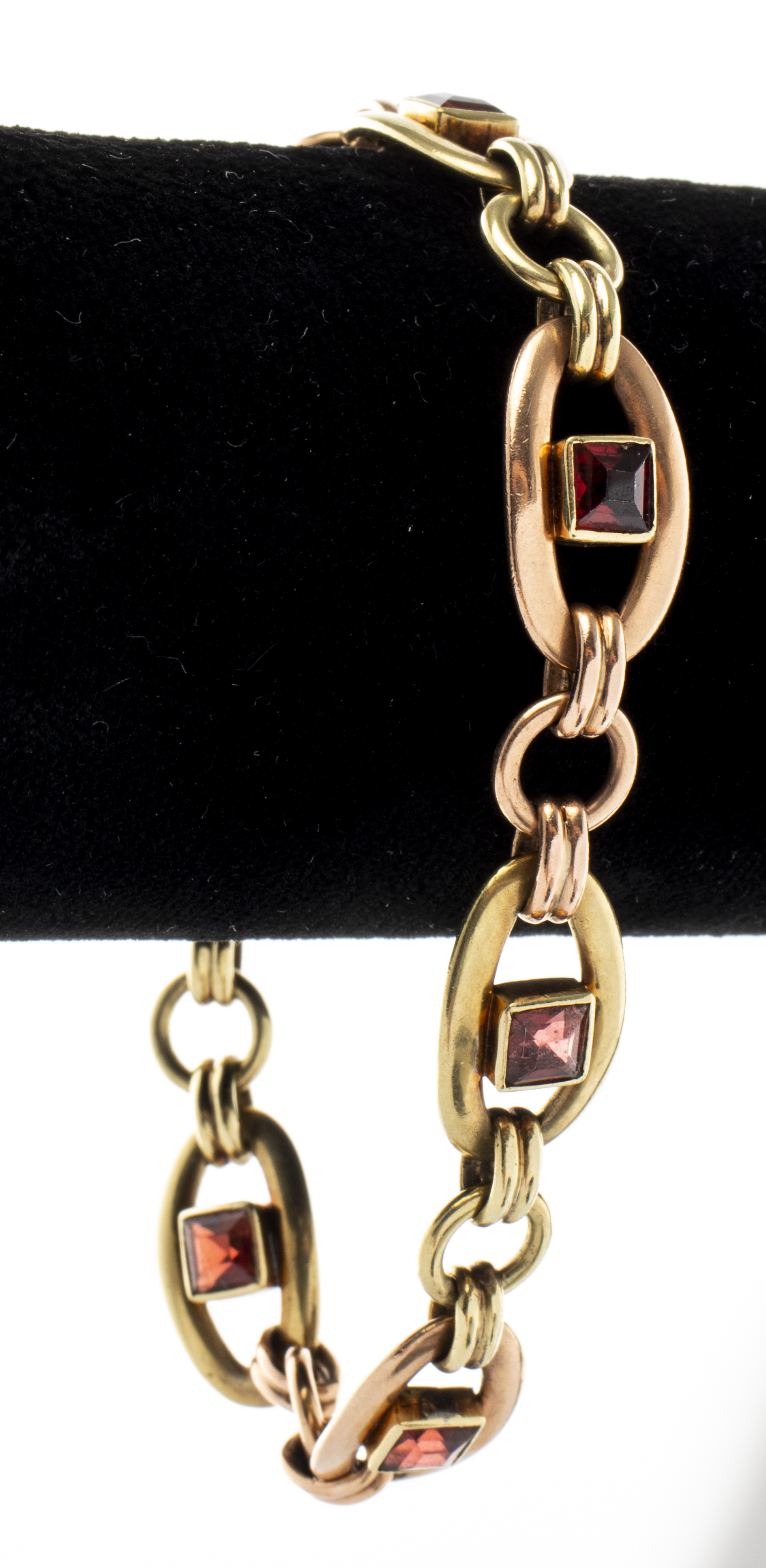 Appraisal: K YELLOW ROSE GOLD GARNET LINK BRACELET Mid-century modern K