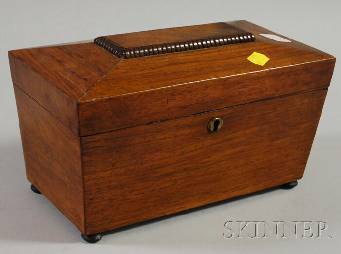 Appraisal: Walnut Veneer Casket-form Footed Tea Caddy marbleized paper-clad fitted interior