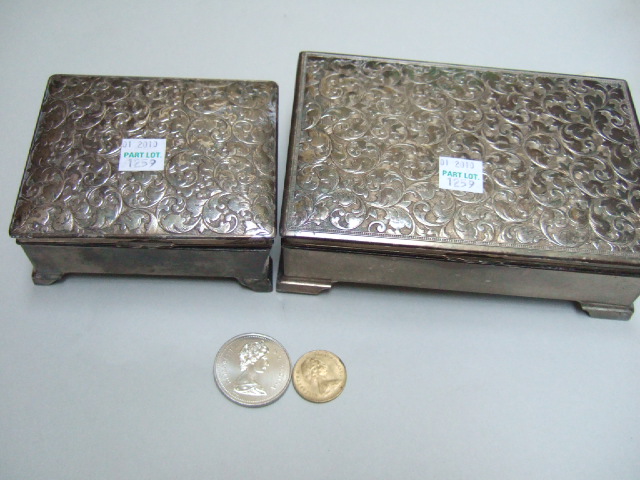 Appraisal: Two plated rectangular boxes containing various items including coins a