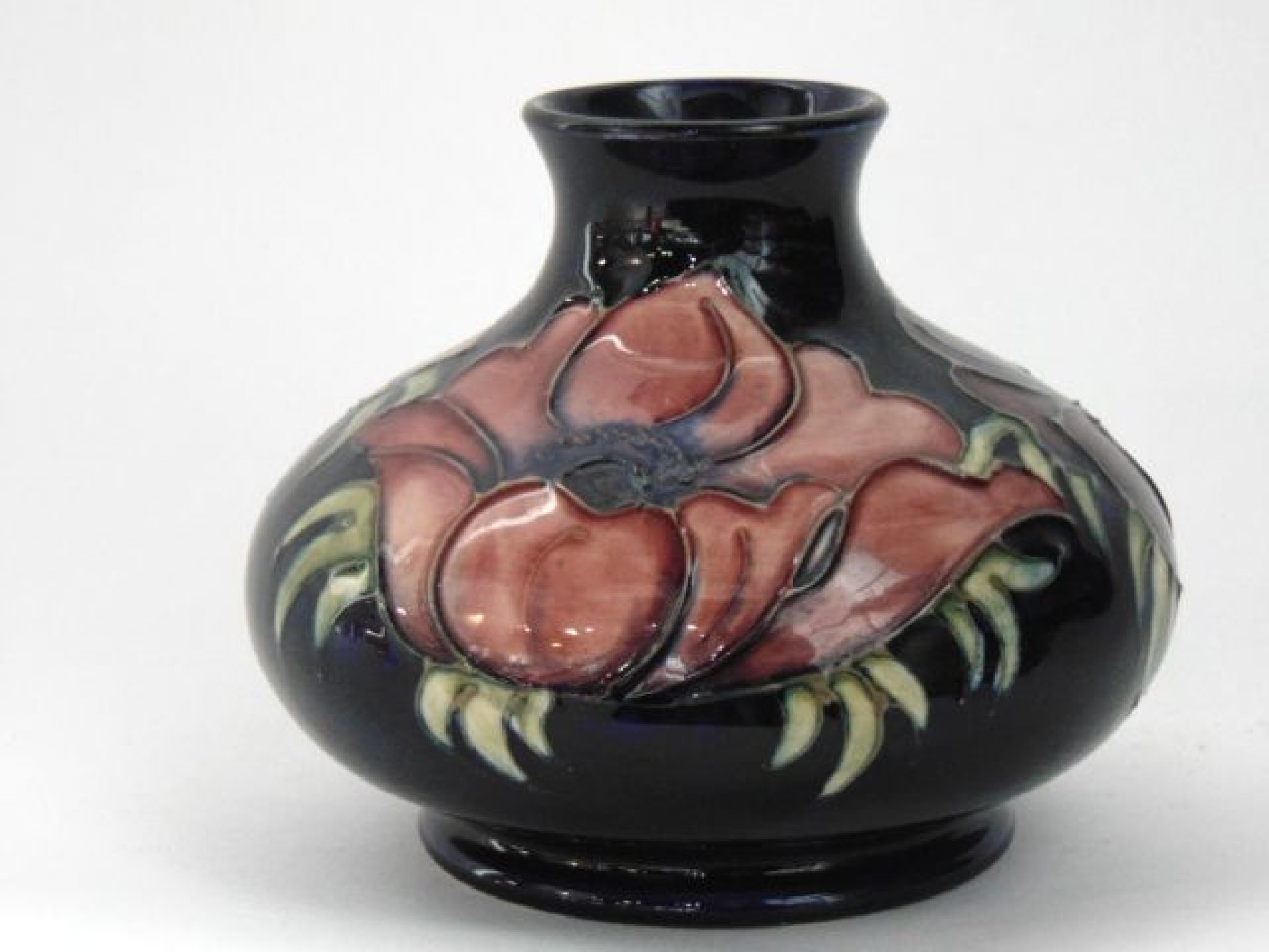 Appraisal: A Moorcroft blue ground vase of flattened globular form with