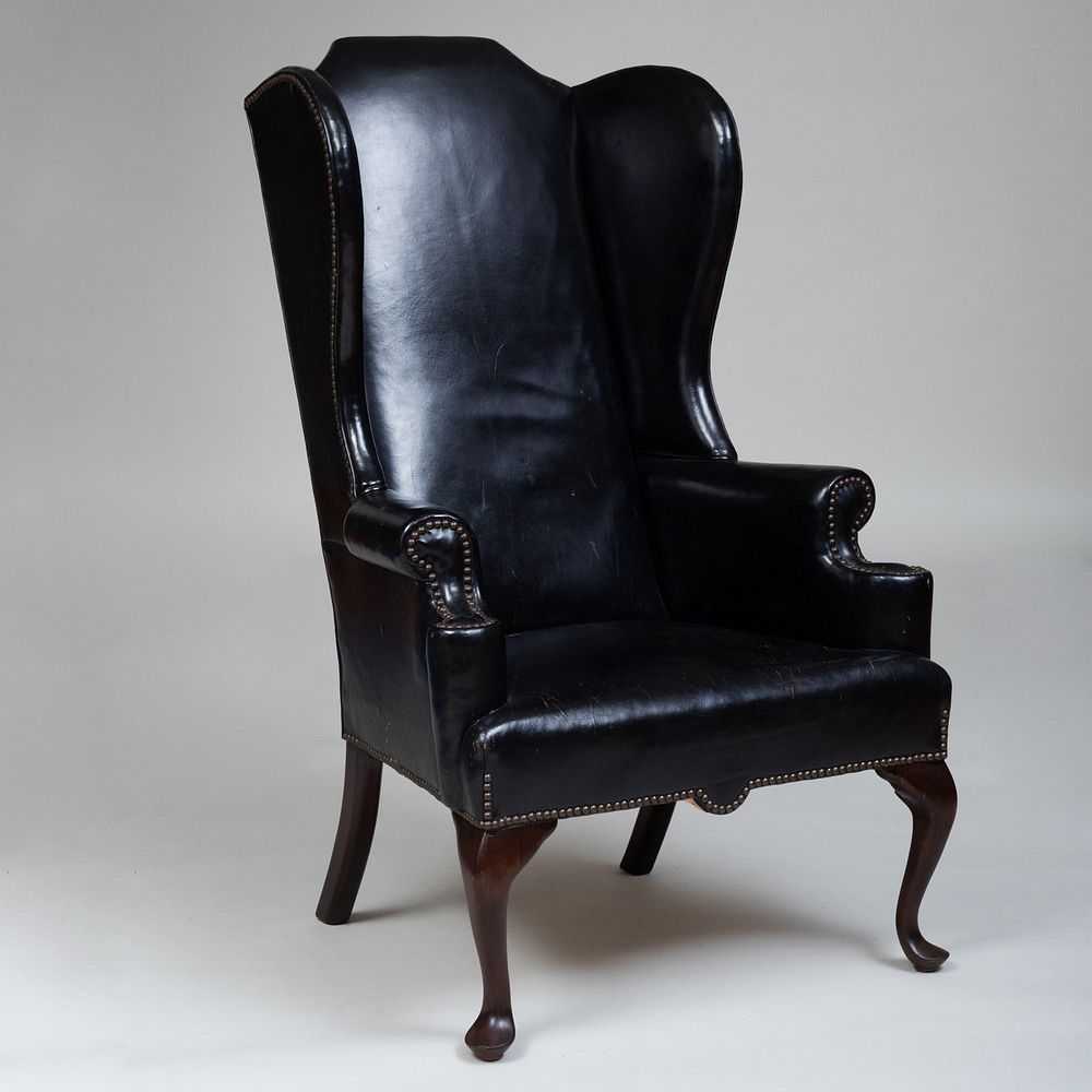 Appraisal: George II Style Mahogany and Leather Upholstered Wing Chair x