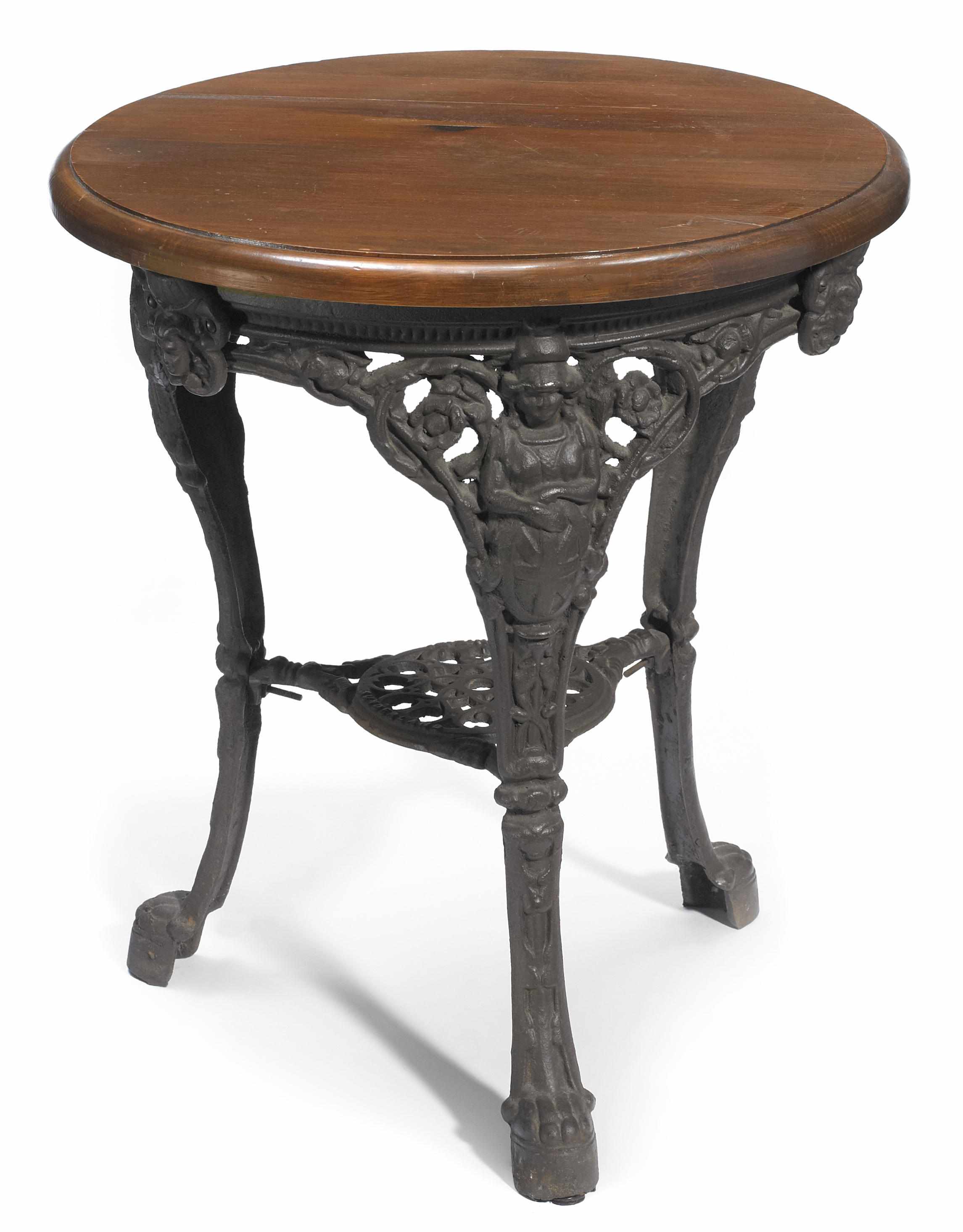 Appraisal: A Renaissance Revival cast iron and oak table height in