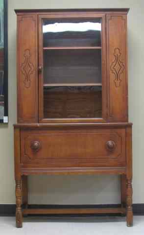 Appraisal: WALNUT CHINA CABINET ON STAND American c 's the top