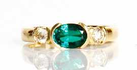 Appraisal: A ct gold green stone and diamond ring total estimated