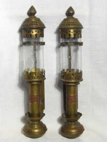 Appraisal: A pair of brass candle lamps marked G W R