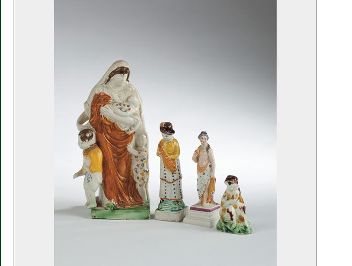 Appraisal: FOUR STAFFORDSHIRE CREAMWARE AND PEARLWARE FIGURES - Comprising a Neale