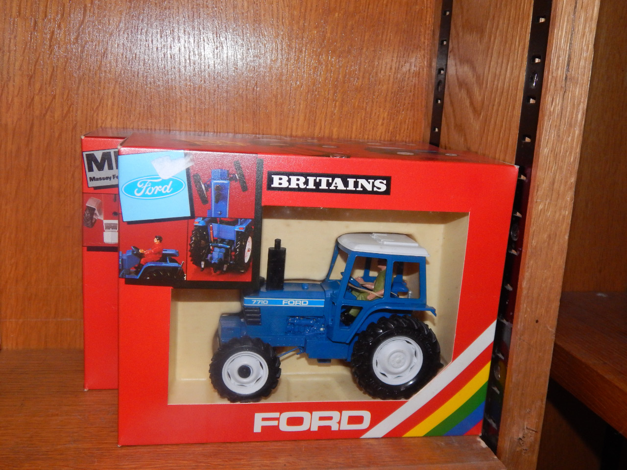 Appraisal: A Britains Ford Tractor T and a Massey Ferguson tractor