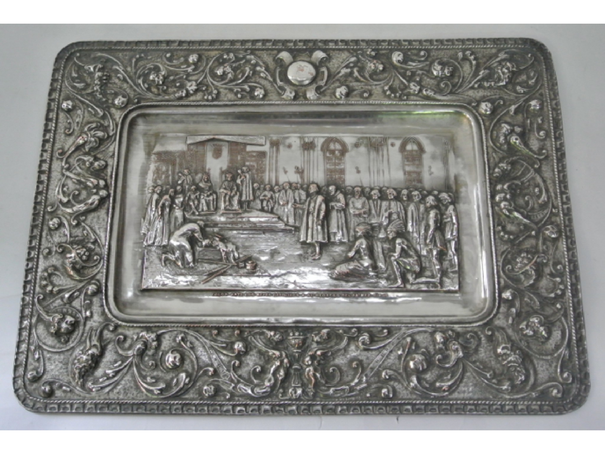 Appraisal: A th century Spanish silver plated panel of rounded rectangular