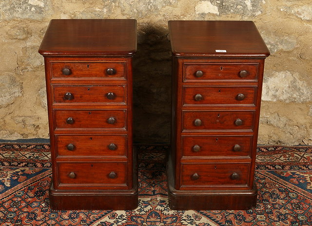 Appraisal: A PAIR OF VICTORIAN MAHOGANY FIVE DRAWER PEDESTALS each with