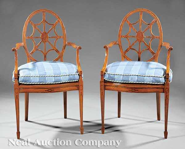 Appraisal: A Pair of Hepplewhite Satinwood Wheelback Armchairs th c oval