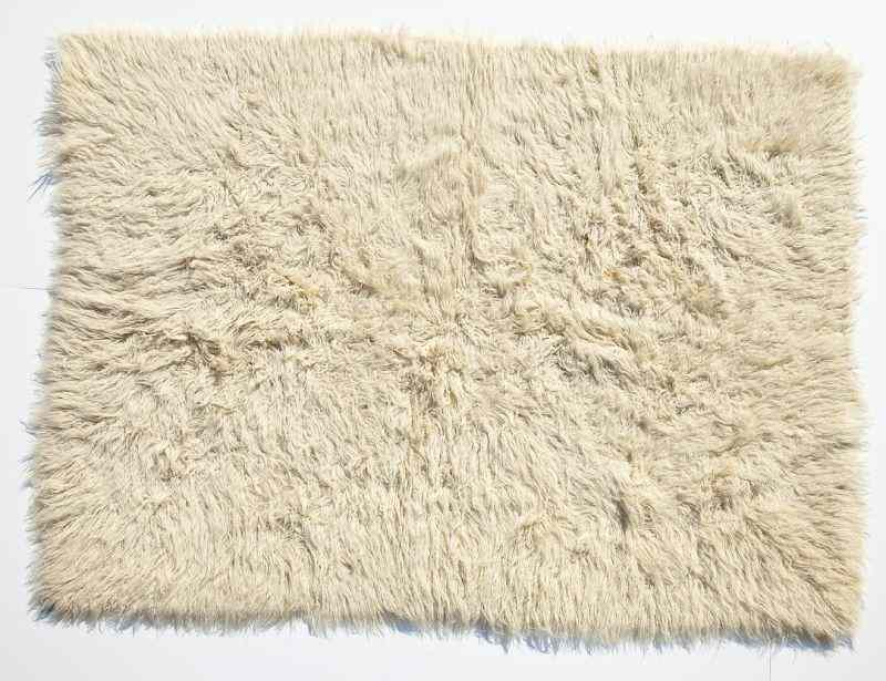 Appraisal: Two Mid Century Modern Flokati Area RugsGreek wool cream colored