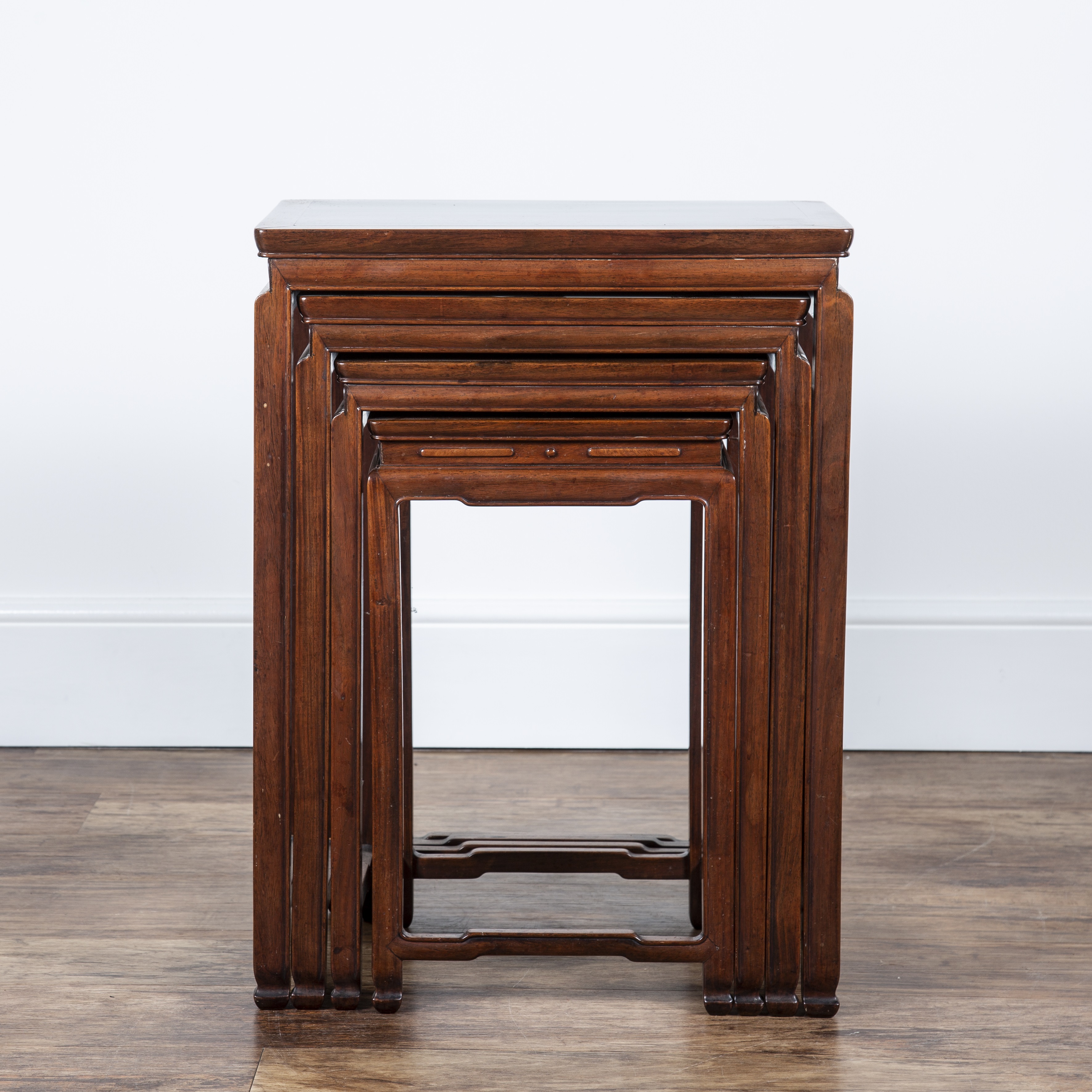 Appraisal: Nest of four hardwood tablesChinese circa each with a rectangular