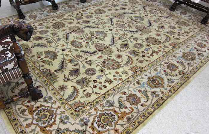 Appraisal: HAND KNOTTED ORIENTAL CARPET Indo-Persian overall meandering floral vine decoration