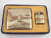 Appraisal: A Japanese boxed set of cigarette case and lighter in