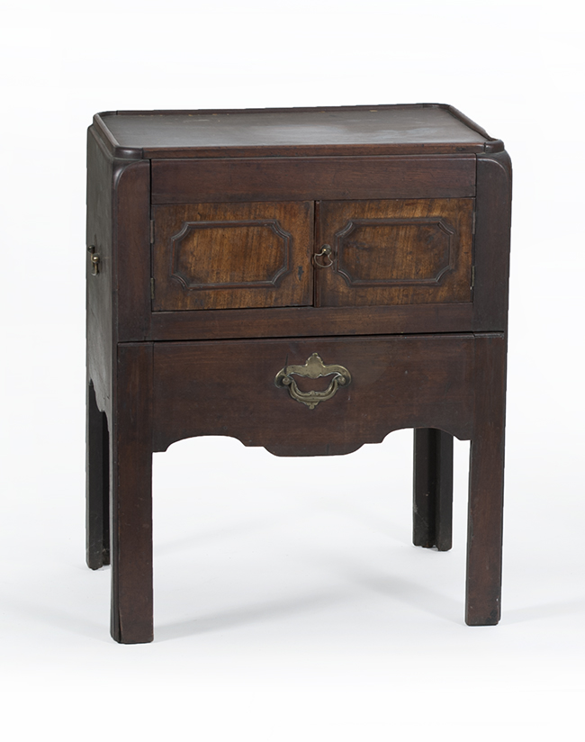 Appraisal: CONTINENTAL COMMODE th CenturyIn walnut with molded top Paneled cupboard