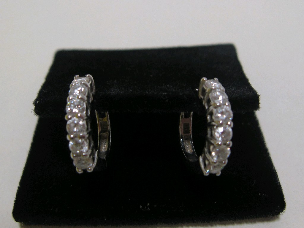 Appraisal: Eighteen carat white gold diamond set hoop earrings