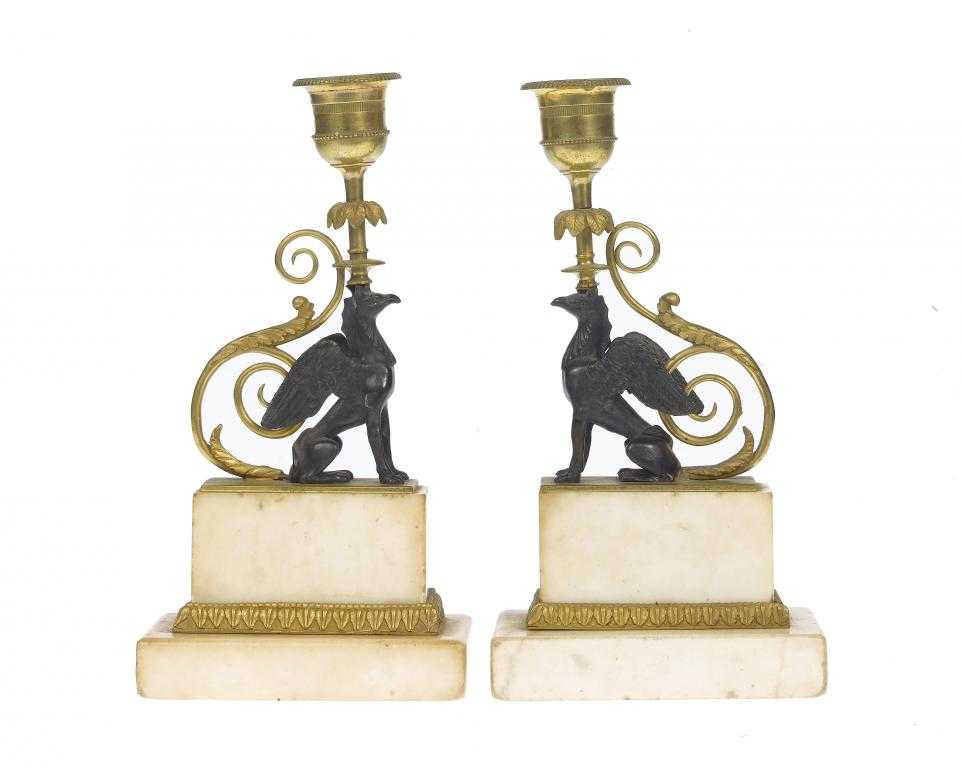 Appraisal: A PAIR OF REGENCY BRONZE AND MARBLE CANDLESTICKS the beaded