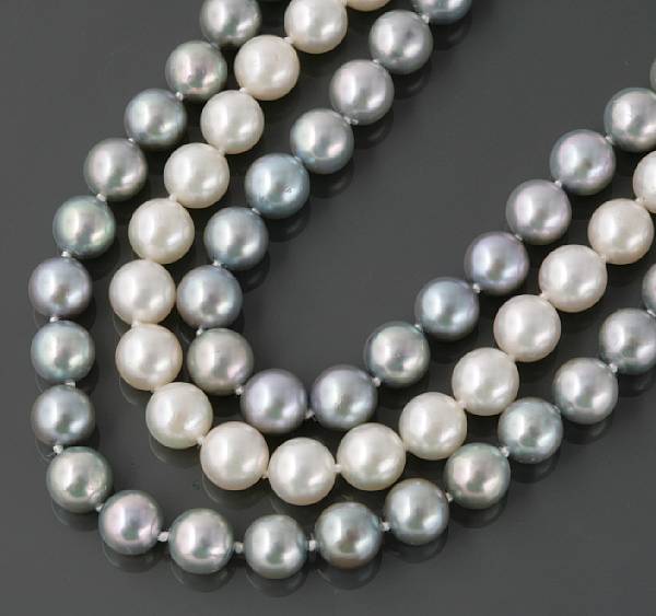 Appraisal: A triple strand of cultured pearls comprised of two strands